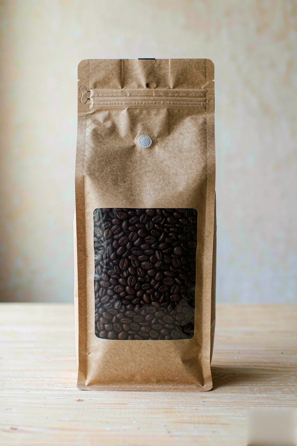 Natural kraft paper stand-up coffee pouch with clear window, true 1LB capacity, one-way valve and resealable zipper by RainRan Packaging